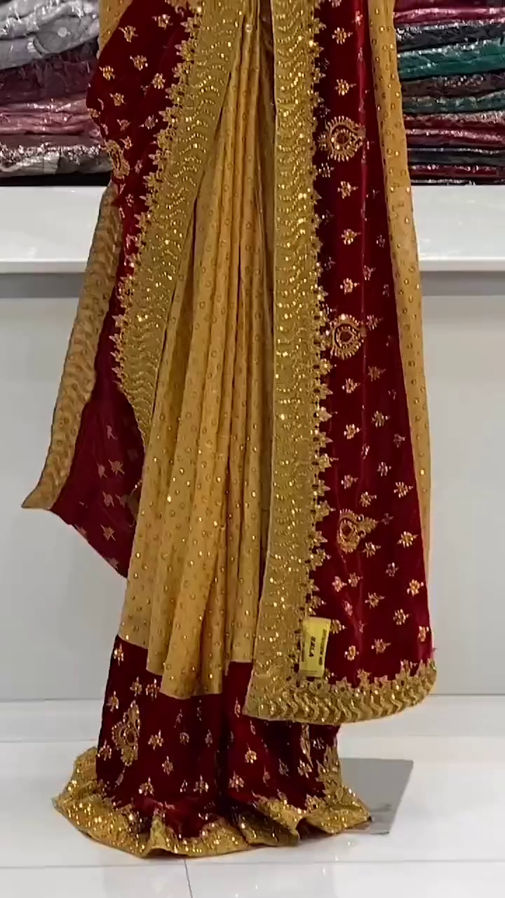 Maroon and Mustard Yellow Velvet Embroidered Saree with Heavy Golden Zari Work and Stone Detailing for Wedding and Festive Occasions