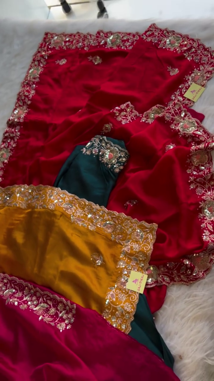 Luxurious Red Silk Saree with Heavy Golden Zari and Sequin Embroidery Border Paired with Contrasting Designer Blouse Pieces in Teal and Mustard Yellow Perfect for Weddings and Festive Occasions