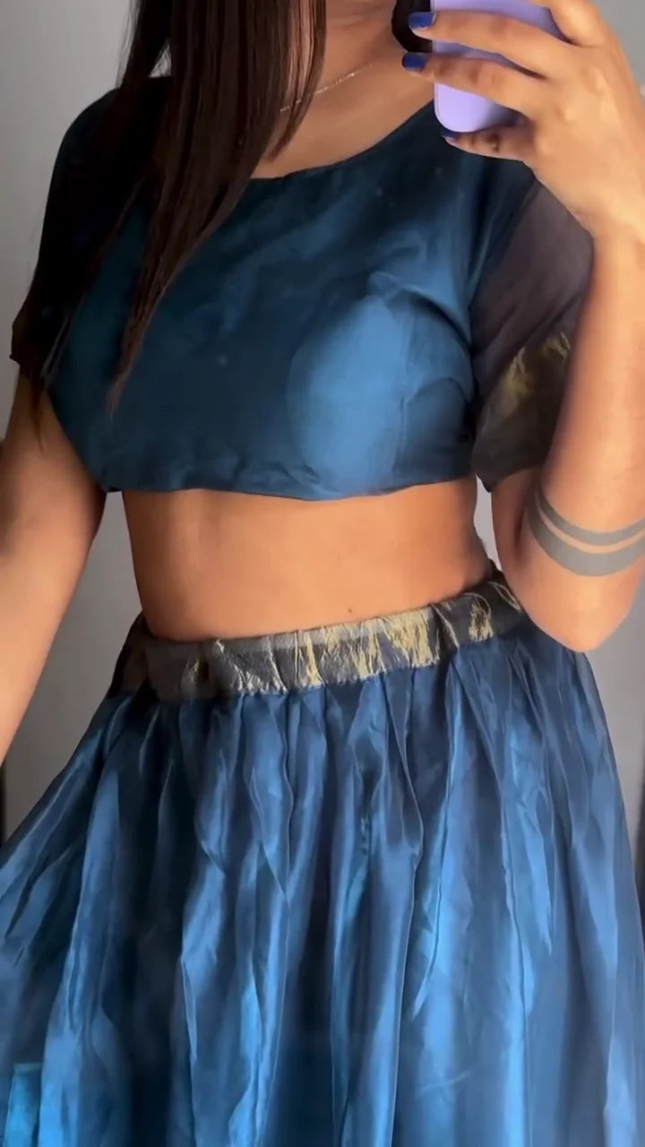 Blue Lehenga Choli Set with Sheer Sleeves and a Golden Border, Featuring a Flowy Skirt with a Stunning Embellished Waistband