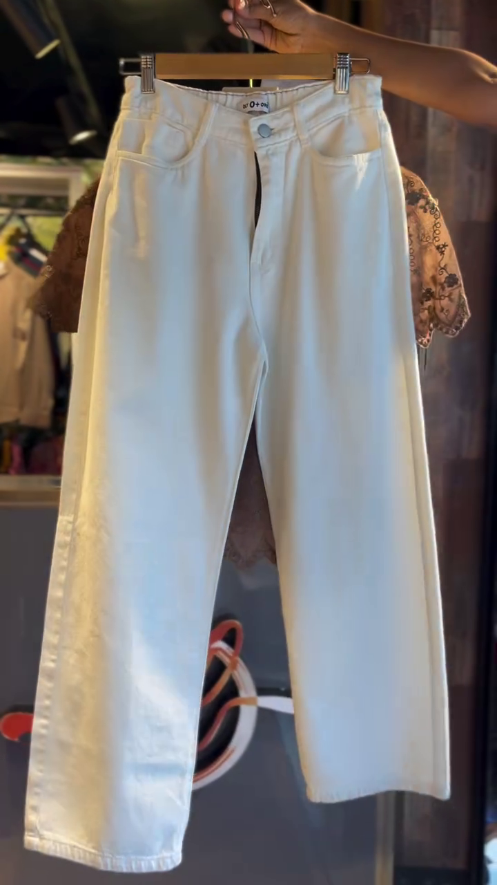 Brown Floral Embroidered Lace Peplum Top with Tassel Tie-Up and Scalloped Hem Paired with White Straight Pants – Stylish Casual and Semi-Formal Outfit for Women