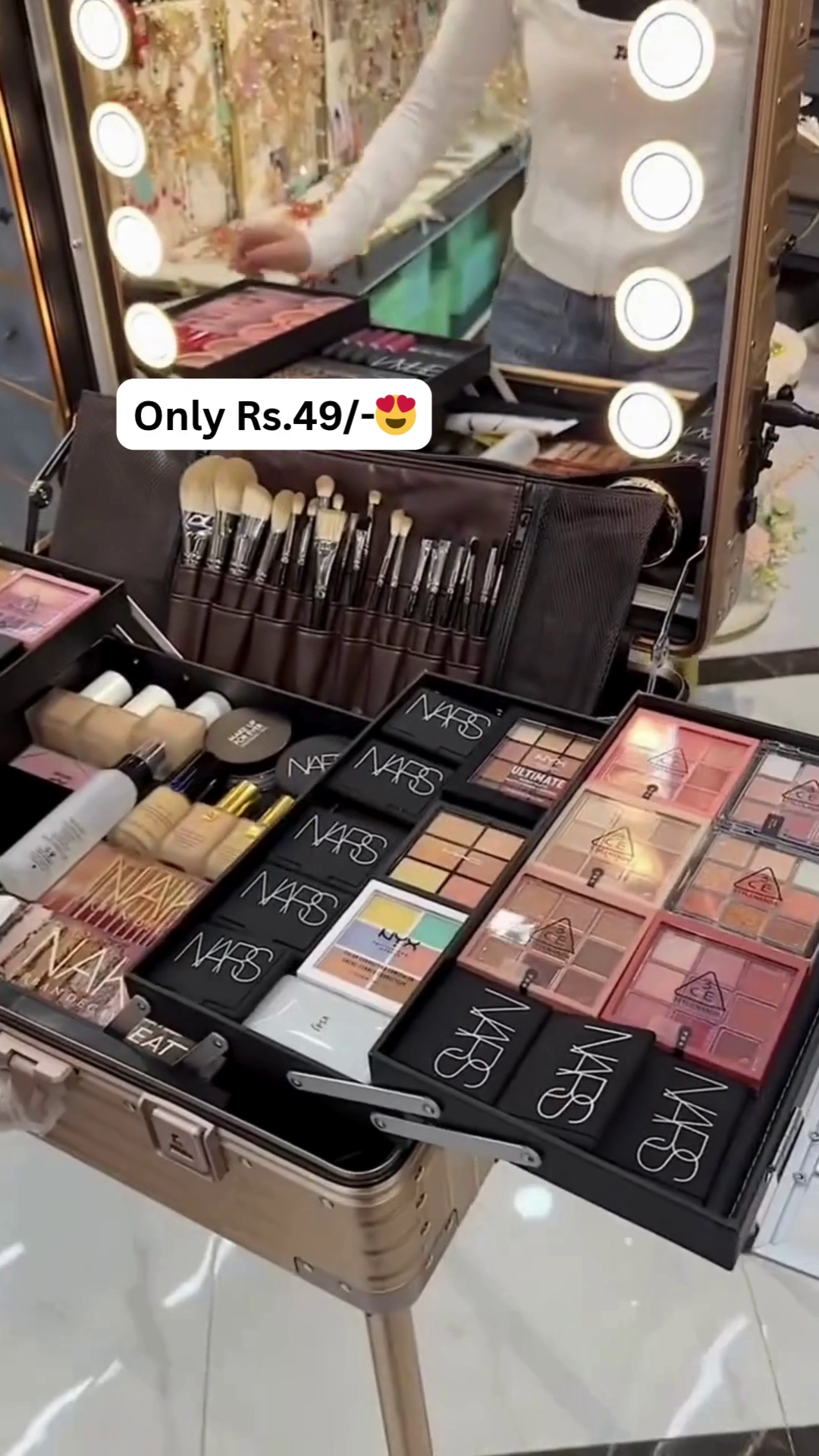 All-in-One Professional Makeup Artist Vanity Case with Premium Makeup Brushes, Foundation, Lipsticks, Eyeshadow Palettes, Highlighters, and Branded Cosmetic Essentials for Full Face Glam Look