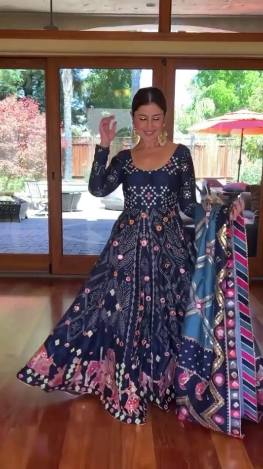 Navy Blue Multicolor Printed Anarkali Gown with Intricate Mirror Work, Elephant Motifs, Floral Embellishments, Full Sleeves, and Coordinated Embroidered Dupatta for Festive and Ethnic Occasions