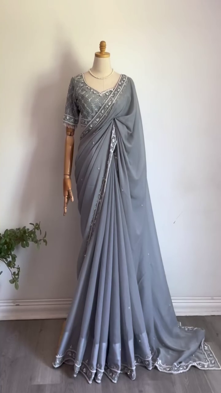 Grey Georgette Saree with Intricate Silver Embroidery, Mirror Work Border, and Matching Heavily Embellished Blouse – Perfect for Festive Occasions, Evening Parties, and Elegant Celebrations