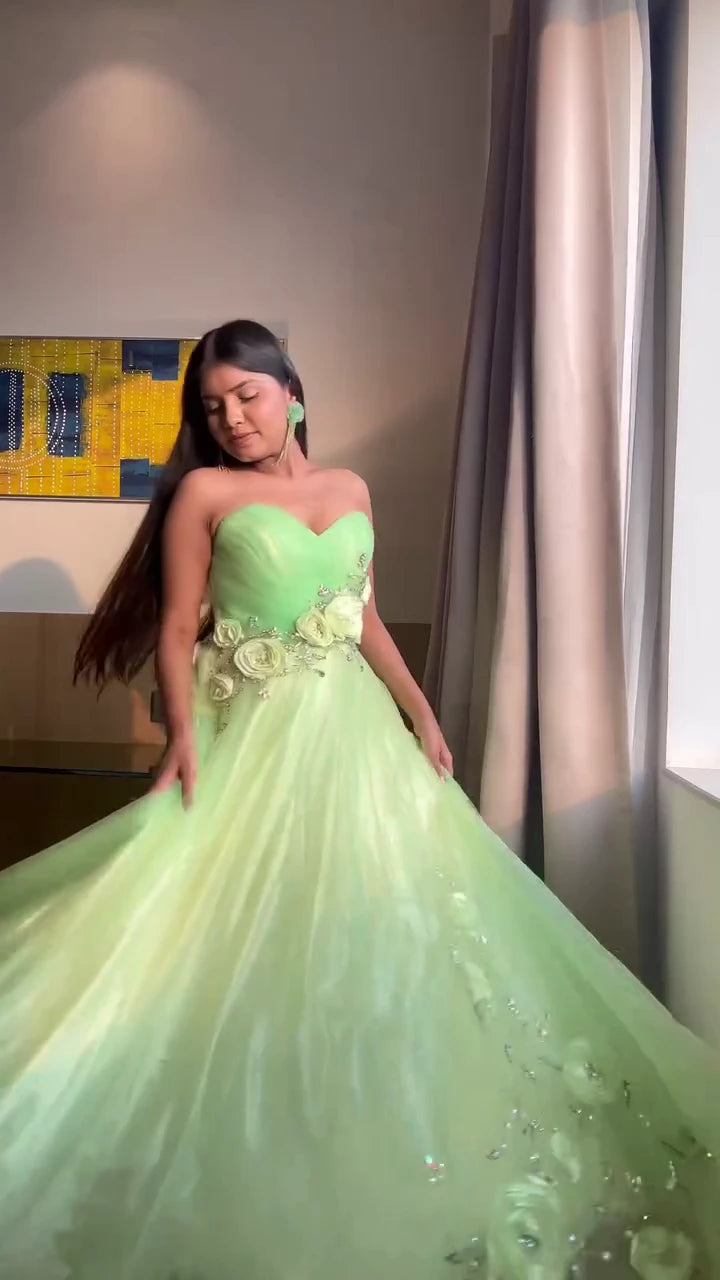 Designer Light Green Strapless Gown with Floral Embellishments and Flowing Layered Net Flair – Elegant Ethnic Party Wear and Reception Dress for Women