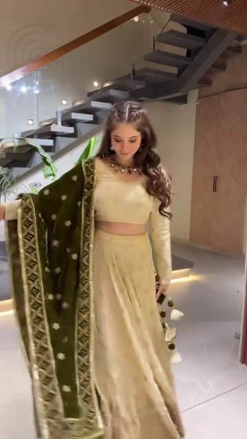 Designer Embroidered Cream Lehenga Choli Set with Heavy Tassel Detailing and Contrasting Velvet Dupatta for Festive and Wedding Wear