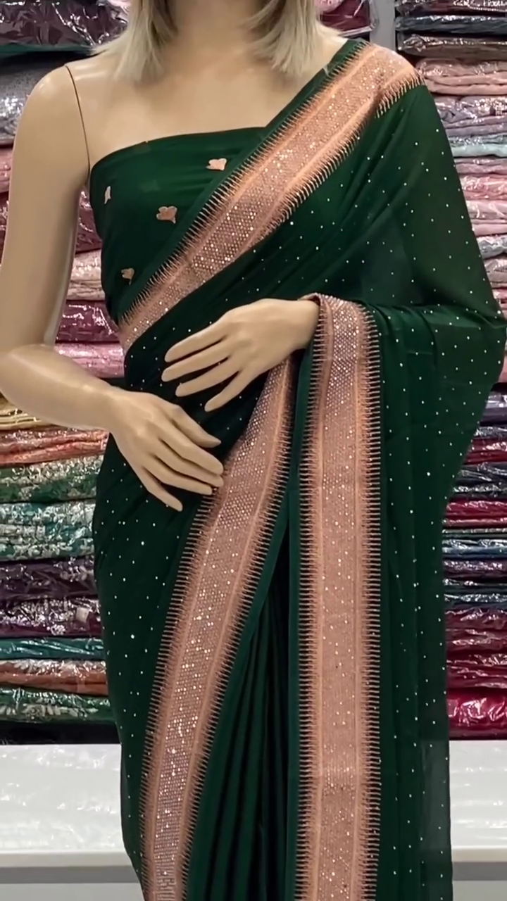 Dark Green Georgette Saree with Rose Gold Sequin Embellished Border and Subtle Stone Detailing for Festive and Party Wear