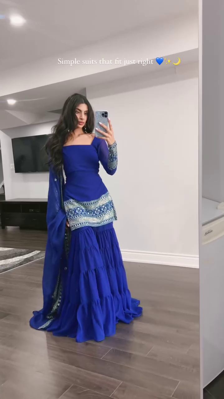 Royal Blue Mirror Work Sharara Suit Set Featuring Square Neck Kurti with Intricate Sleeve Embroidery, Tiered Gharara Bottom, and Matching Dupatta – Perfect for Festive and Wedding Occasions