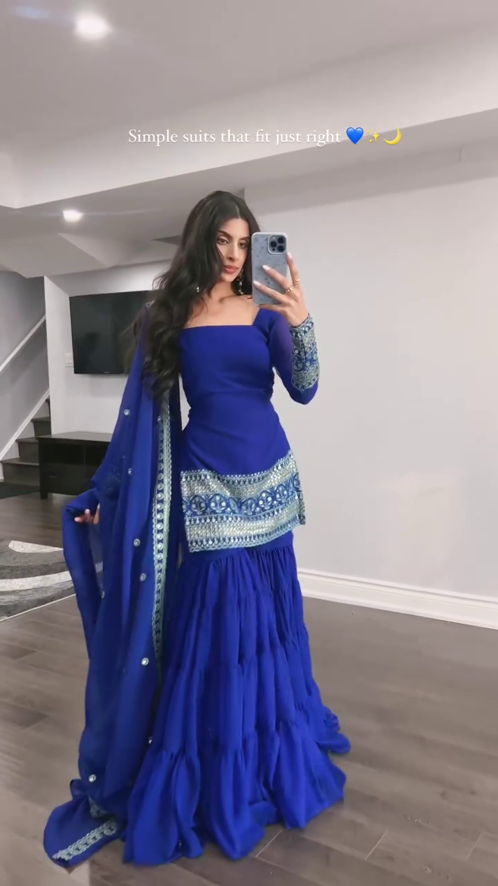 Royal Blue Mirror Work Sharara Suit Set Featuring Square Neck Kurti with Intricate Sleeve Embroidery, Tiered Gharara Bottom, and Matching Dupatta – Perfect for Festive and Wedding Occasions