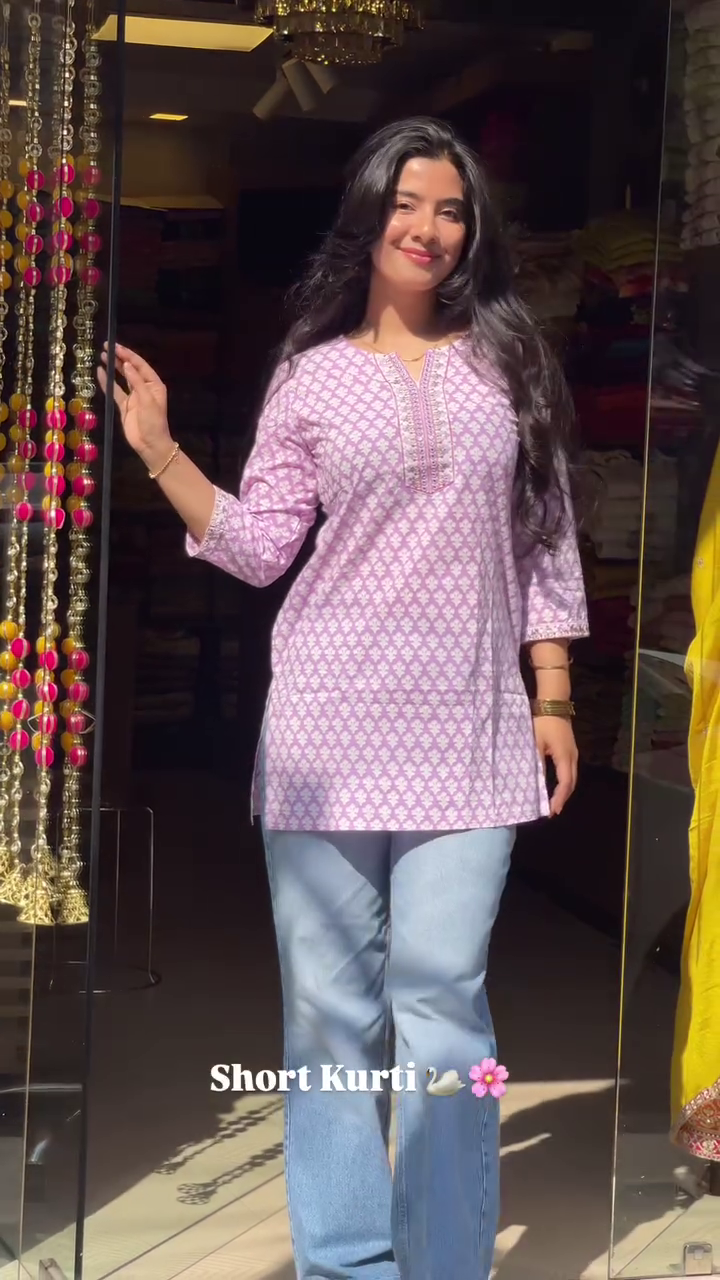 Stylish Printed Short Kurti Collection Featuring Delicate Embroidery on Neckline and Sleeves – Available in Pastel Pink, Sage Green, and Soft Red Shades – Perfect for Casual Outings, Workwear, and Everyday Comfort with Jeans or Trousers
