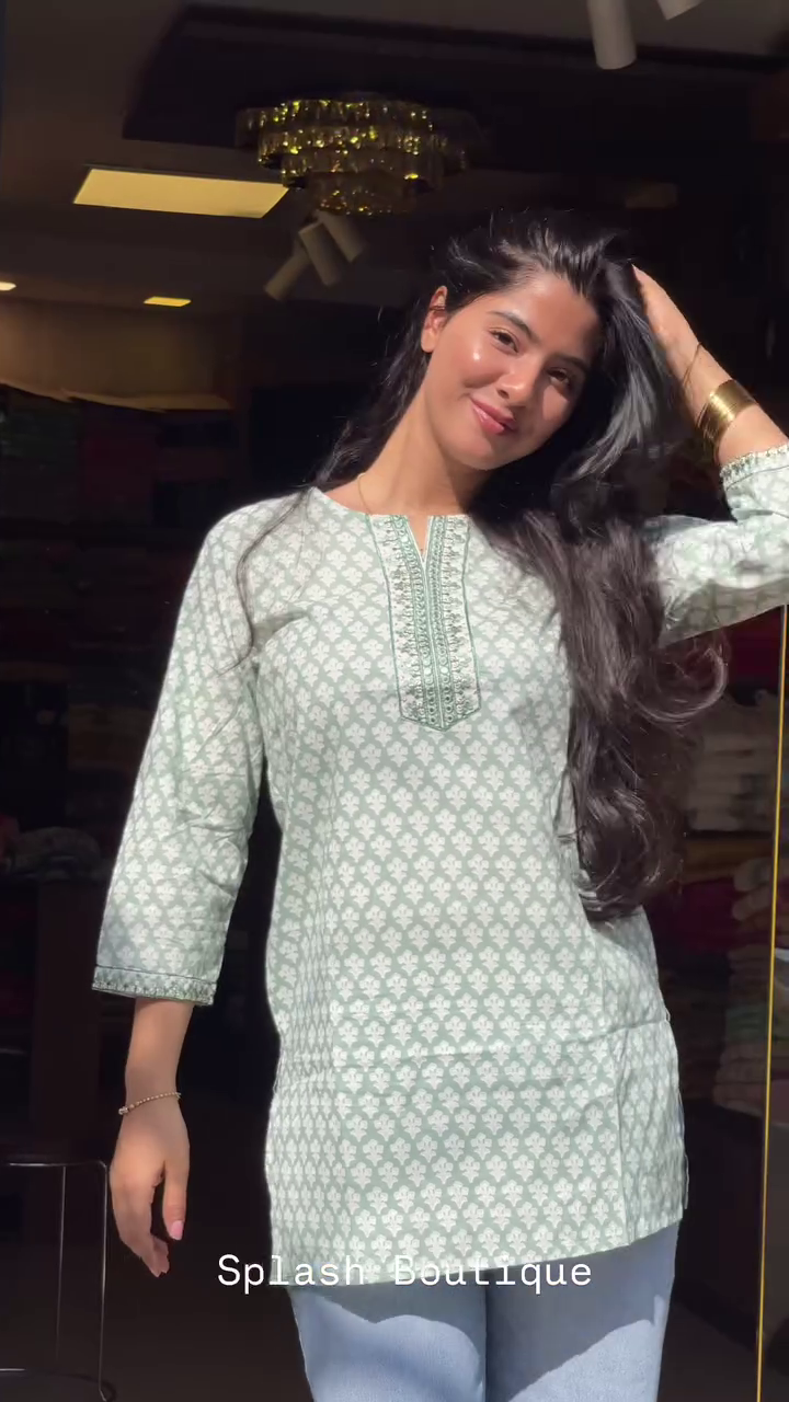 Stylish Printed Short Kurti Collection Featuring Delicate Embroidery on Neckline and Sleeves – Available in Pastel Pink, Sage Green, and Soft Red Shades – Perfect for Casual Outings, Workwear, and Everyday Comfort with Jeans or Trousers